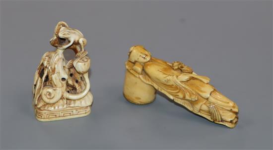 A Chinese ivory frog and lotus seal and a Chinese ivory cane handle modelled as He Xiangu, 19th century